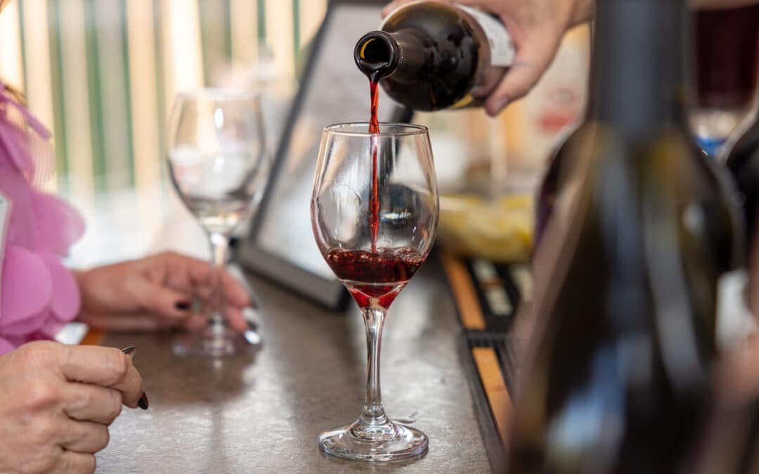 wine being poured into wine glass