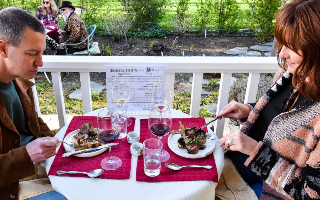 Enjoying lamb and red wine