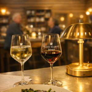 Two wine glasses and plate of food